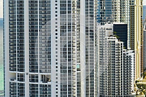 Sunny Isles Beach city with luxurious highrise hotels and condo buildings on Atlantic ocean shore. American tourism