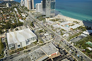 Sunny Isles Beach city with luxurious highrise hotels and condo buildings and busy ocean drive on Atlantic coast