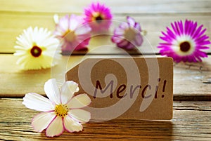 Sunny Label With French Text Merci With Cosmea Blossoms