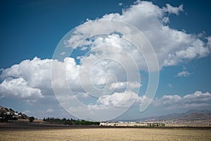 Sunny landscape with spectacular clouds and blue sky of the plains of the State of Hidalgo photo