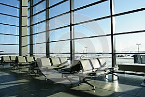Sunny lounge in airport with no people