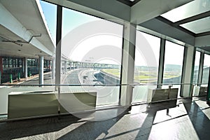Sunny on modern glass office windows building interior corridor