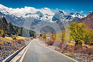 Sunny morning scene of Theth National Park with snowy peaks on background.