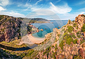 Sunny morning view from flying drone of Li Cossi beach. Spring in Sardinia