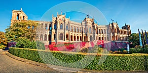 Sunny morning view of Maximilianeum, Home of the Bavarian State Parliament, with interiors viewable by guided tour only and a park