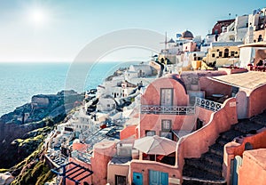 Sunny morning view of Santorini island. Picturesque spring scene of the famous Greek resort Oia, Greece, Europe. Traveling concept