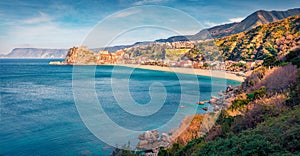 Sunny morning view of Scilla town with Ruffo castle on background, Calabria, Italy