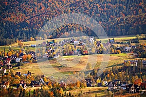 Sunny October day in mountain village. Autumn in Poland