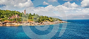 Sunny panoramic view of old Venetian lighthouse. Colorful morning seascape of Ionian Sea. Wonderful outdoor scene of Kefalonia