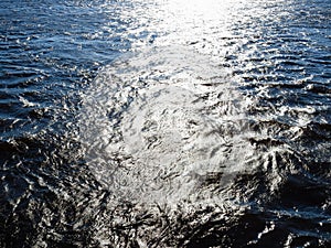 Sunny path on water surface of Great Neva river