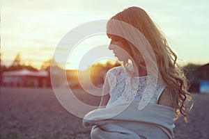 Sunny portrait of a beautiful young romantic woman