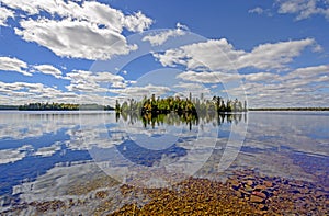 Sunny Reflections on a Clear Lake