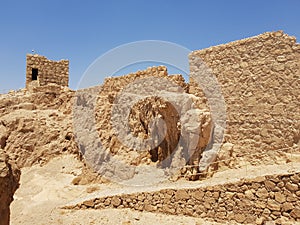 Sunny scenery of old building ruins in Masada National Park, Israel