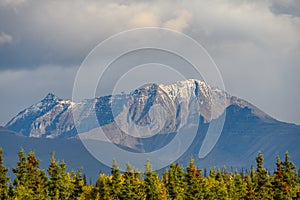 Sunny scenic rugged landscape with snow on the mountain peaks, Katmai National Park, Alaska