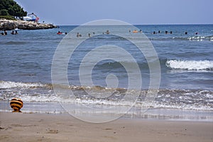 Sunny sea side with a wavy  blue sea, outdoor photography