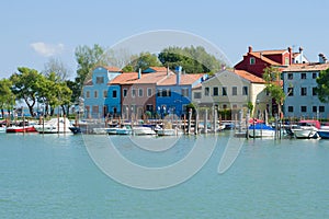 A sunny September day on the embankment of the Burano island. Venice, Italy