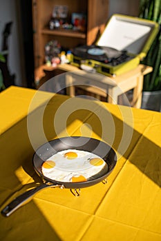 Sunny side up eggs, fried eggs in a pan