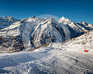 Sunny Ski Slope and Mountains Peaks in Zermatt