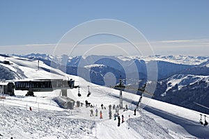Sunny ski slopes of the snowy mountain resort Rosa Khutor