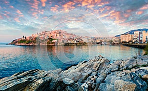 Sunny spring panorama of Aegean Sea. Coloful sunrise in Kavala city, the principal seaport of eastern Macedonia and the capital of photo