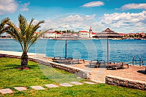 Sunny spring view of popular summer resort Porec. Colorful spring seascape of Adriatic Sea. Great morning scene of Istrian