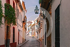 The sunny street in Cordoba, Spain photo