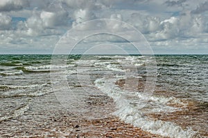 Sunny summer day by Baltic Sea copy space for text travel agency.Wandelust Travel background.Power of water energy passing.Amazing