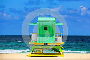 Sunny summer day, with blue sky and Atlantic Ocean. Miami Beach, Florida, USA sunrise and life guard tower.