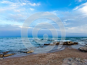 Sunny summer day on the lake. Mountains and sea. Kyrgyzstan, Lake Issyk-Kul