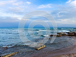 Sunny summer day on the lake. Mountains and sea. Kyrgyzstan, Lake Issyk-Kul