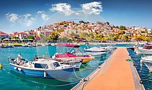 Sunny summer  view of Astros port. Wonderful morning seascape of Myrtoan Sea. photo