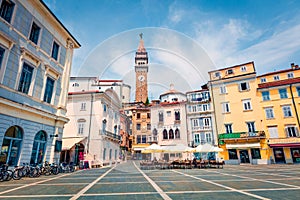 Sunny summer view of Tartini Square in old town Piran. Splendid spring morning of Slovenia, Europe. Traveling concept background.