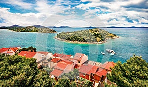 Sunny summer view of Tribunj village. Splendid morning seascape of Adriatic sea, Croatia, Europe. Beautiful world of Mediterranean