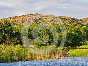 Sunny view of the landscape around Wichita Mountains Wildlife Refuge