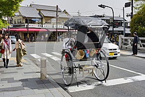 Sunny view of man pulled cart