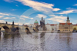 Sunny view of Old Prague bridge and river