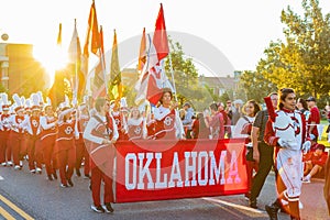 Sunny view of the student Marching Band walking in Homecoming parade