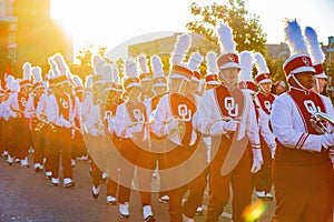 Sunny view of the student Marching Band walking in Homecoming parade