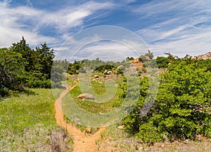 Sunny view of the Treasure Lake trail landscape of Wichita Mountains