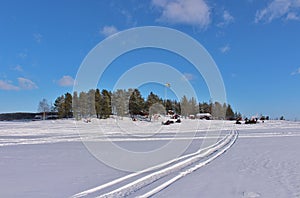 Sunny winter day at GrÃ¥sjÃ¤lÃ¶ren in LuleÃ¥