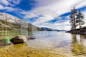 Sunny winter day on the shoreline of Lake Tahoe, Sand Harbor State Park, Sierra mountains, Nevada