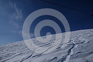 sunny winter morning in the mountains of sheregesh on the ski track