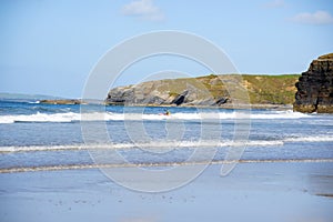 Sunny winter view of kayaker at ballybunion