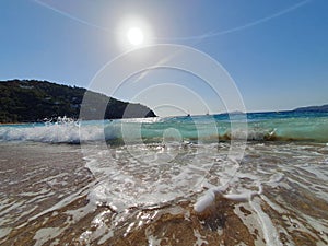 Sunnyday beach sand clear water photo