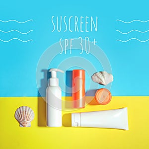 Sunprotection objects, suscreen. Flat lay, natural cosmetics, cream SPF for face and body photo
