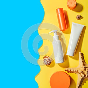 Sunprotection objects, suscreen. Flat lay, natural cosmetics, cream SPF face and body. Summer Travel Concept photo