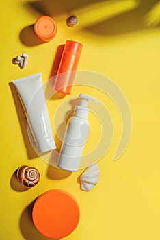 Sunprotection objects, suscreen. Flat lay, natural cosmetics, cream SPF for face and body. Summer Concept photo