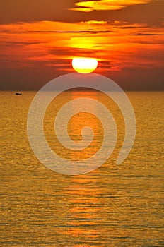 Sunraise on sea and boat