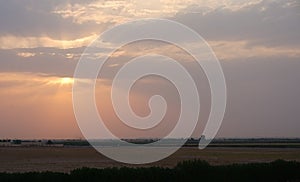 Sunray, Clouds, Horizon and Silhouette