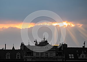 Sunrays above the old building